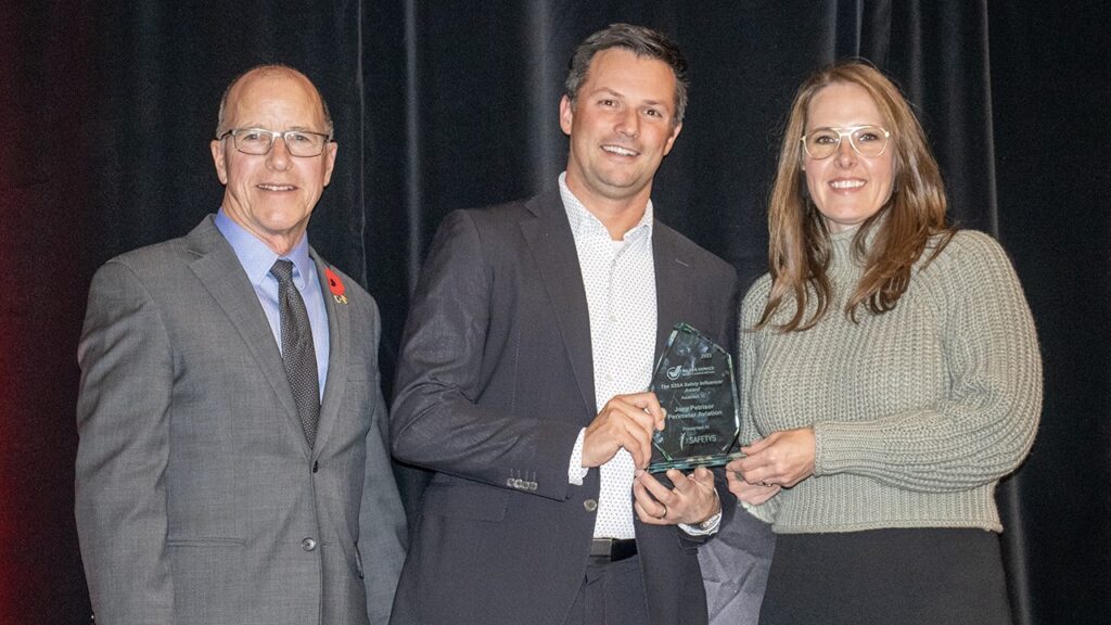 Image of Jacquelyn Oduro, S2SA Safety Program Director (far right), presents The Safety Influencer Award to Joey Petrisor, President and CEO of Perimeter Aviation (middle) along with City Councillor Shawn Dobson at The Safetys Gala on November 1, 2023.